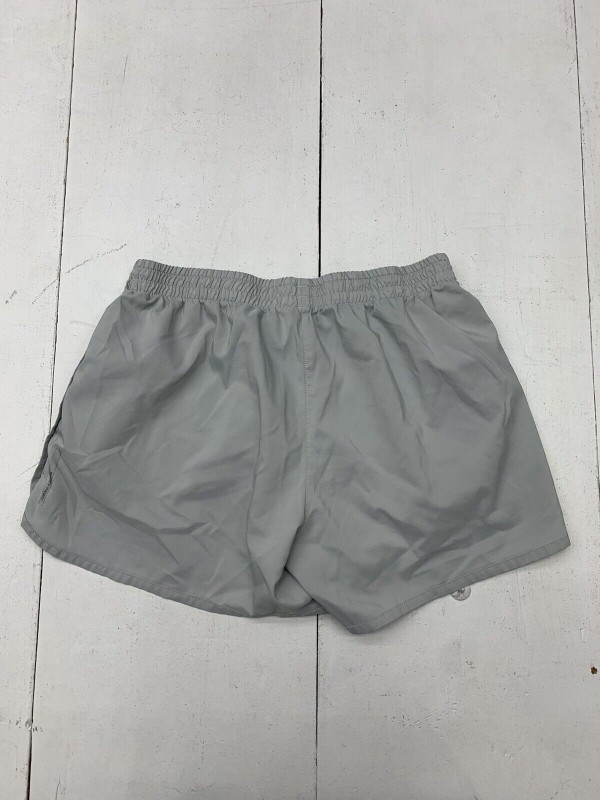 Adidas women's light gray sports shorts, size M-