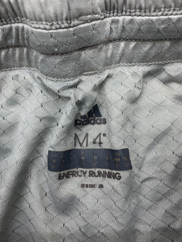 Adidas women's light gray sports shorts, size M-